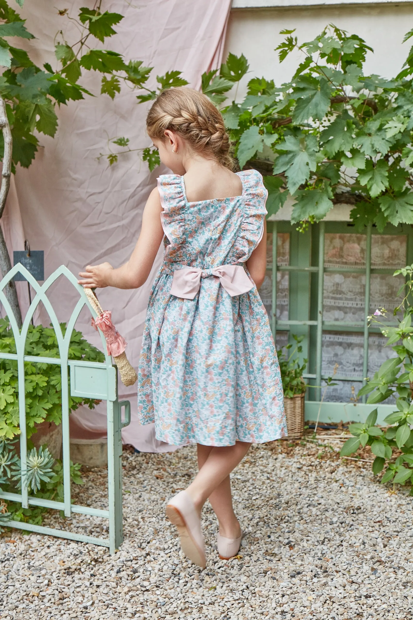 Mélina Smocked Dress with Ruffles in Coral and Mint Floral Print